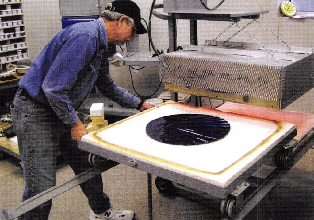 John Smith moving furnace base with enamel work under beating elements