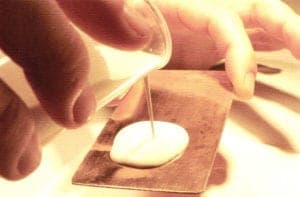 Apply the industrial liquid enamel by pouring and rotating