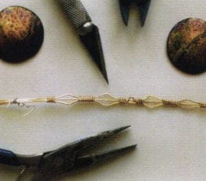 Pre-formed wire bezel