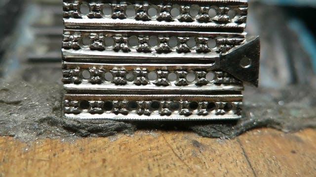 Close-up of Bright-Cut silver plate