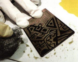 With a clean cloth or steel wool, apply the black chemistry patina (calcium polysulfide) by rubbing into the metal.