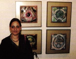 Jyoti Singh with works from the exhibition
