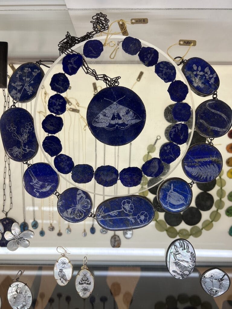 lapis lazuli and mother-of-pearl etchings